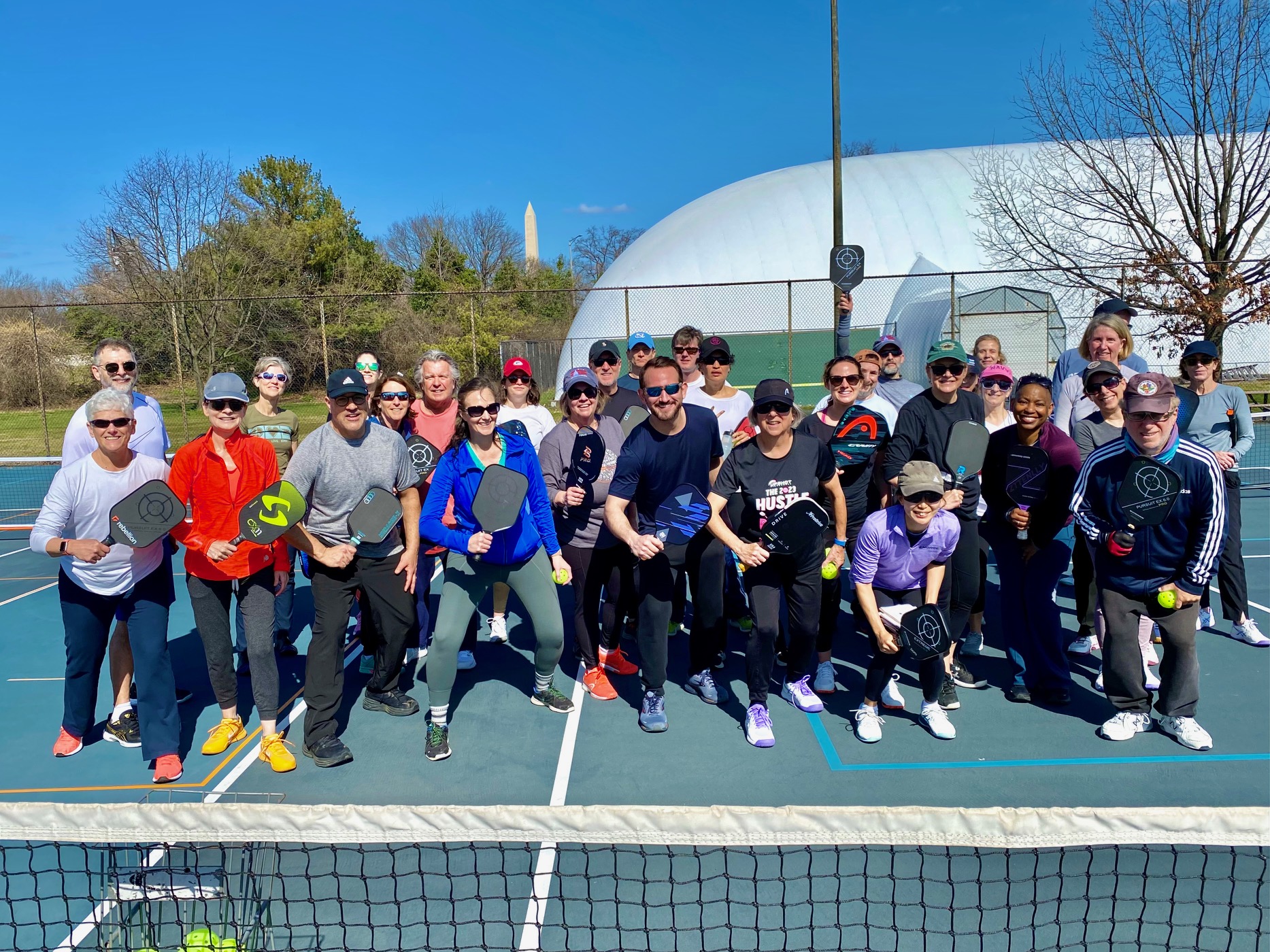 PPR Certified Coach leading a DCPL pickleball clinic.